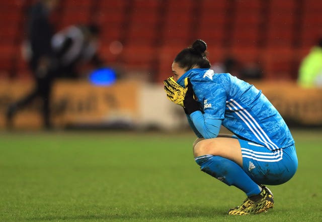 Arsenal goalkeeper Manuela Zinsberger appears dejected after the final whistle of the FA Women's Continental League Cup final