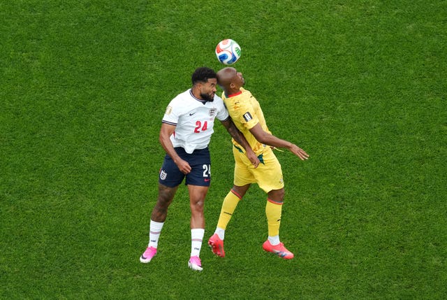 England’s Reece James, left, and Ghana’s Jordan Ayew clash heads as they challenge for a high ball