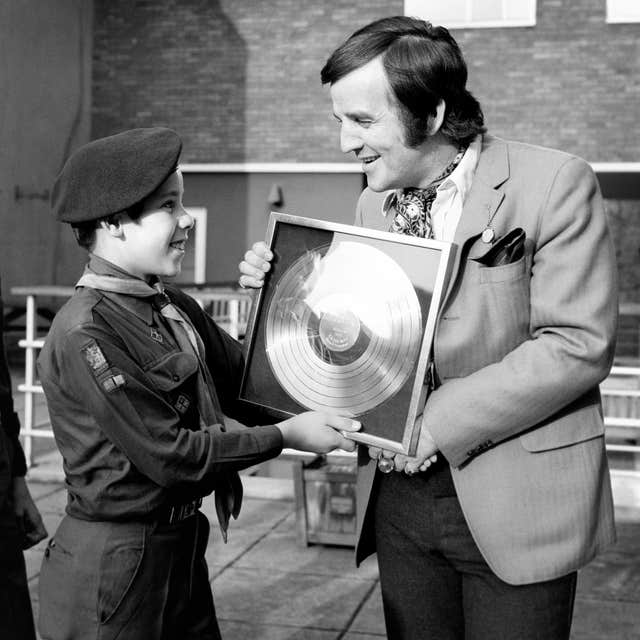 Alan 'Fluff' Freeman with an award 