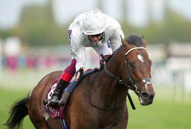 Frankie Dettori celebrates winning the Lockinge at Newbury on Palace Pier