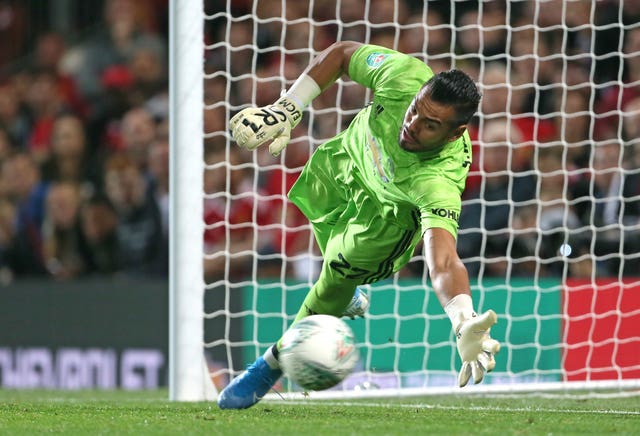 Romero's save sent United through