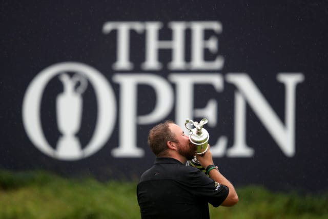 Shane Lowry celebrates with the Claret Jug after winning The Open