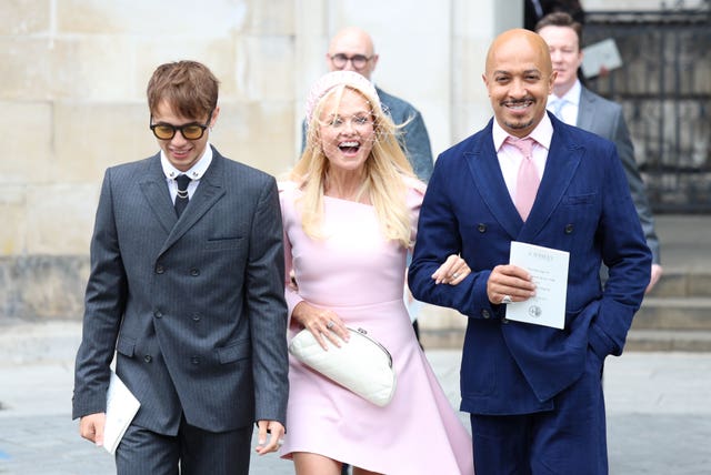 Emma Bunton, her partner Jade Jones and son Beau, leave following the wedding of Spice Girl Melanie Brown, Mel B, to fiance hairdresser Rory McPhee at St Paul’s Cathedral, London