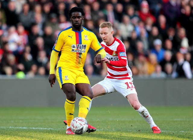 Doncaster Rovers v Crystal Palace – FA Jeffrey Schlupp (left) scored one of Crystal Palace's goals in their 3-0 win at Doncaster (Richard Sellers/PA).