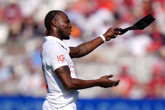 England’s Jofra Archer removes his arm compression sleeve on day two of the third Test at Lord’s