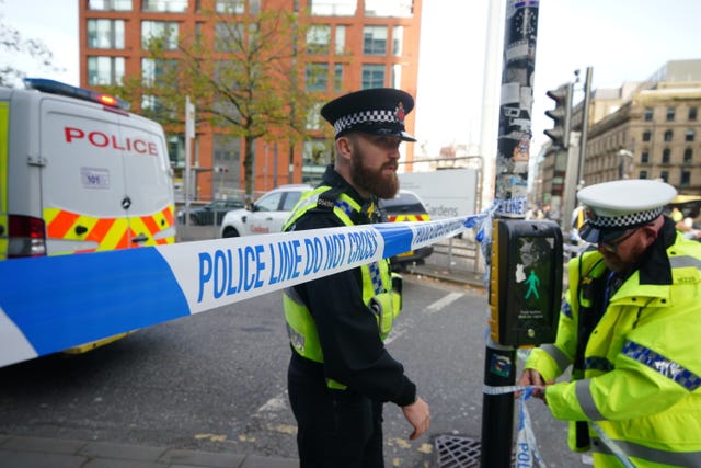 Police officers at the cordon in central Manchester