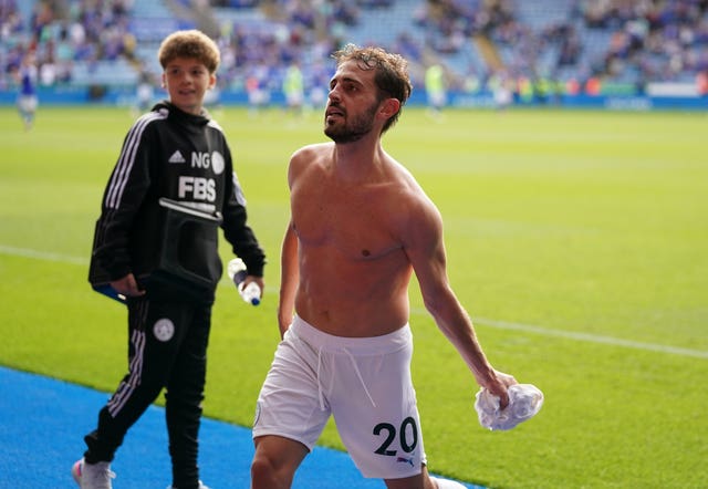 Bernardo Silva throws his shirt into the crowd after the match