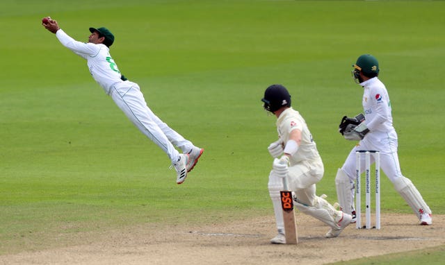 Dom Bess falls to a brilliant catch by Asad Shafiq, left