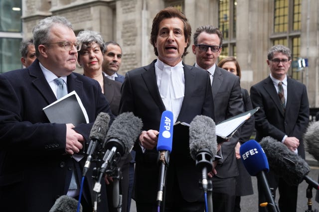 The duke's barrister, David Sherborne, reading a statement on Harry's behalf after he settled his claim against NGN (Lucy North/PA)