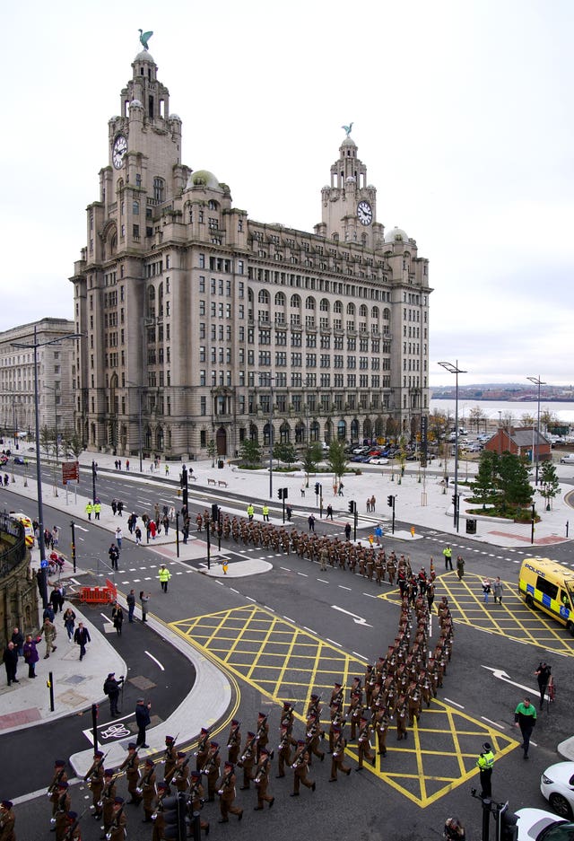 1st Battalion of The Duke Of Lancaster’s Regiment march through the streets of Liverpool to Our Lady & Saint Nicholas Church before observing a two minute silence to remember the war dead on Armistice Day