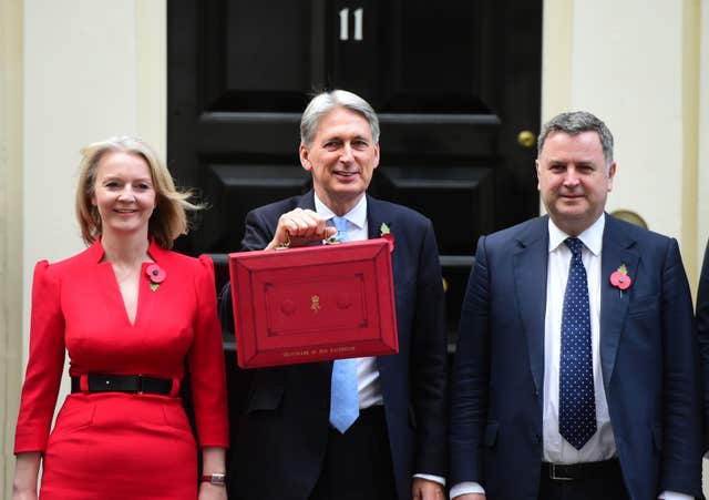 Mel Stride, right, with Chancellor Philip Hammond, centre, in Downing Street