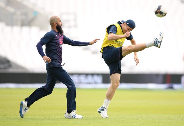 England's Moeen Ali (left) and Chris Woakes during a training session