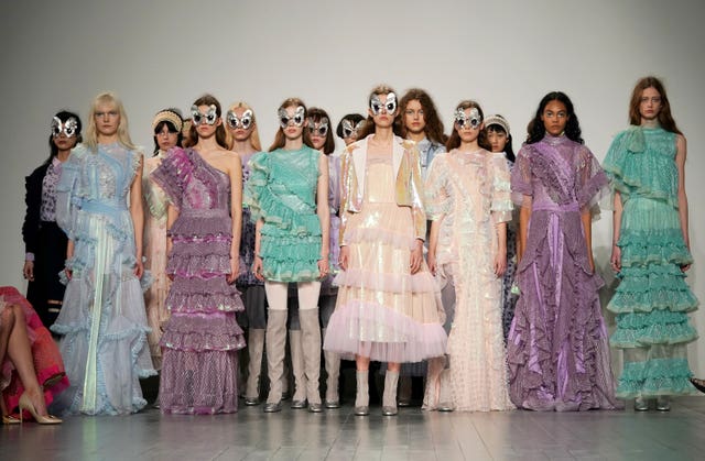 Models on the catwalk during the Bora Aksu Autumn/Winter 2019 London Fashion Week show at the Garden Museum, London.