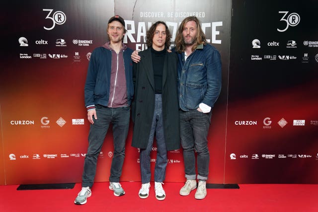 (Left-right) Carl Dalemo, Johnny Borrell and Andy Burrows attend the European premiere of Razorlight: Fall To Pieces as part of the Raindance Film Festival at Genesis Cinema, Mile End Road, London, in 2022