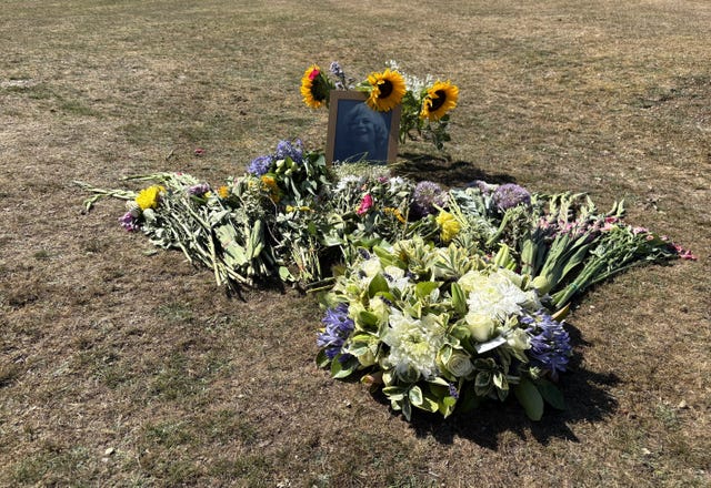 Floral tributes including a wreath laid by Reform UK leader Nigel Farage near to the home of Ann Widdecombe