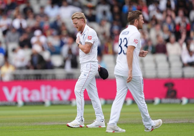 England’s captain Ben Stokes rubs his shoulder after bowling an over during day five of the Fourth Rothesay Men’s Test at the Emirates Old Trafford