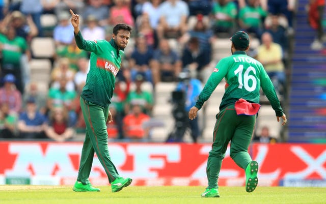 Shakib Al Hasan, left, collected the prize Afghanistan scalp of Mohammad Nabi (Adam Davy/PA)