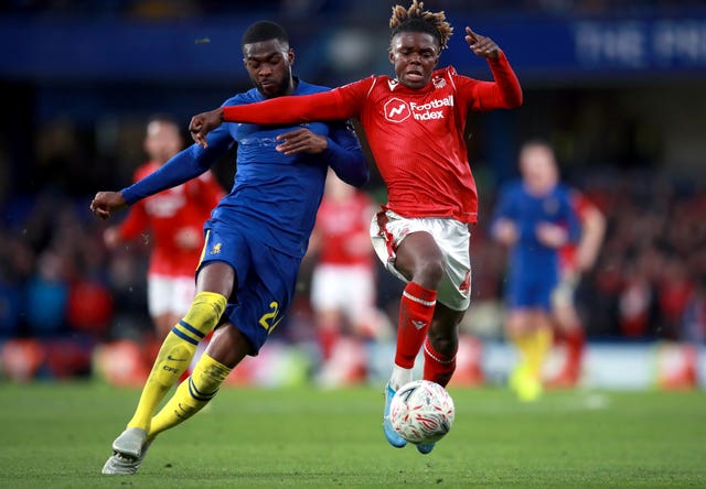 Chelsea's Fikayo Tomori (left) and Nottingham Forest's Alex Mighten during the FA Cup third round 