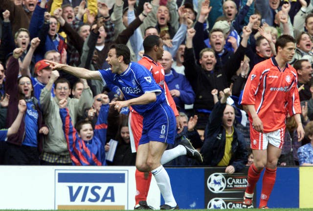 Gus Poyet celebrates a goal for Chelsea