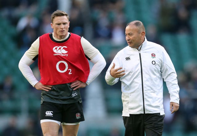 Chris Ashton, left, chats with head coach Eddie Jones