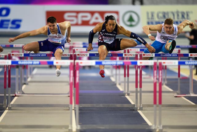 Great Britain’s Andy Pozzi (left) lost his 60m title