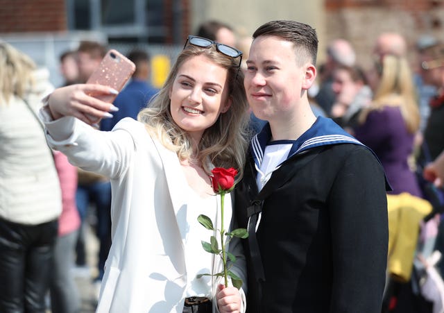 Engineering Technician Luke Astley poses for a selfie with his partner Tara Andersen