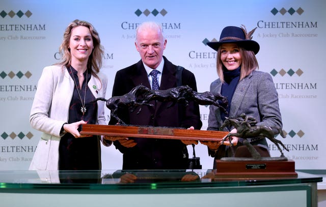 Amy Williams (left) and Victoria Pendleton (right) present Willie Mullins with the leading trainer trophy