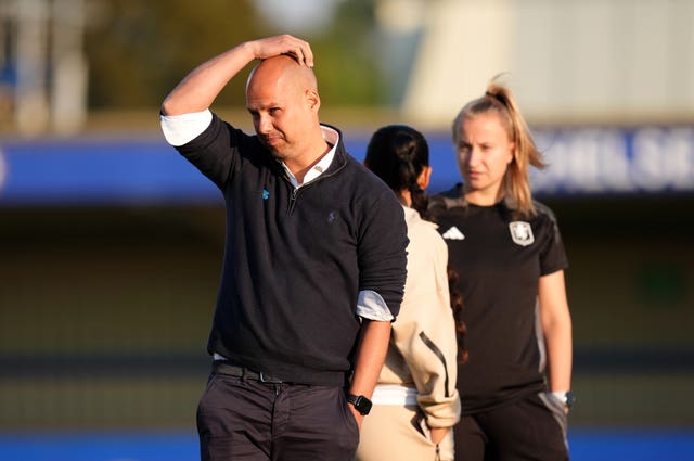 Aston Villa manager Robert de Pauw scratches his head before the game against Chelsea