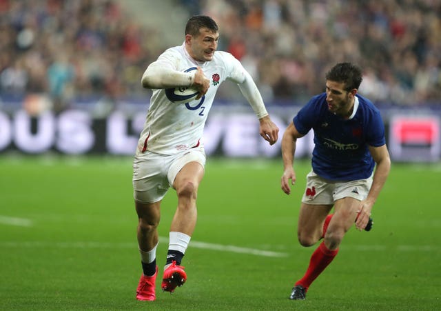 Jonny May scored two second-half tries to spare England's blushes after a poor display in their opening Guinness Six Nations match
