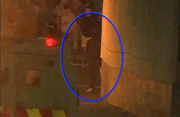 CCTV image of the man (circled) suspected of firing the shots that killed Lyra McKee