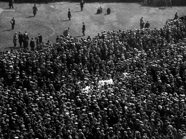 A pitch invasion at Wembley Stadium following the 1923 FA Cup final, just months after Arthur Kinnaird's death