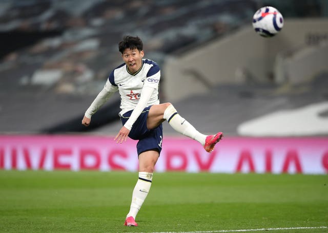 Son Heung-min scores his side's fourth goal 