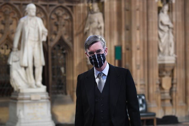 House of Commons Leader Jacob Rees-Mogg wears a mask in Central Lobby