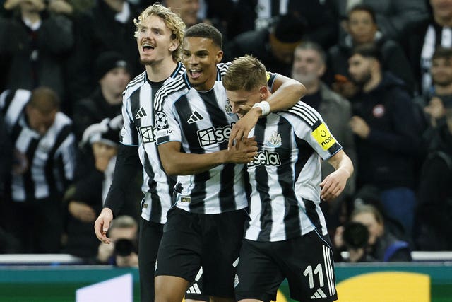 Newcastle celebrate after making it 3-0