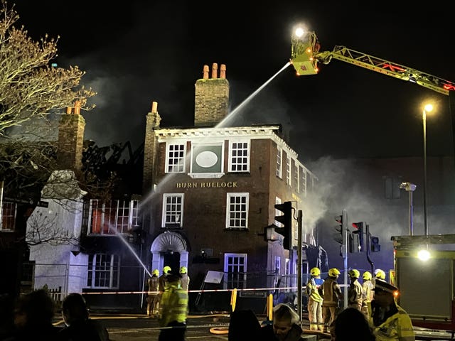 Firefighters putting out the blaze on Friday evening 
