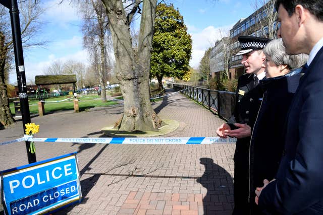Prime Minister Theresa May, with Wiltshire Police Chief Constable Kier Pritchard and Salisbury MP John Glen, in Salisbury as she views the area where Russian double agent Sergei Skripal and his daughter Yulia were found (Toby Melville/PA)