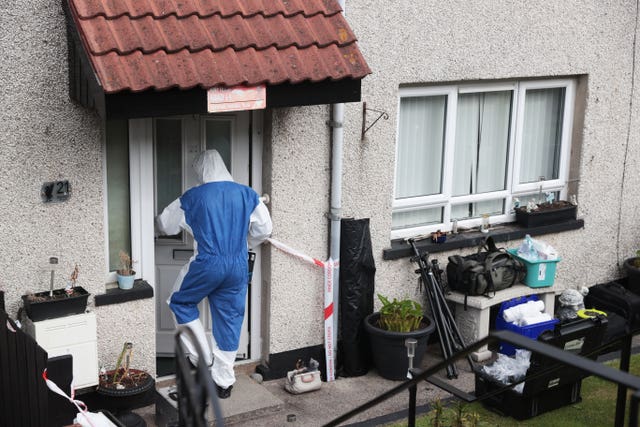 A PSNI scenes of crime officer in the Marian Park area of Downpatrick, Co Down