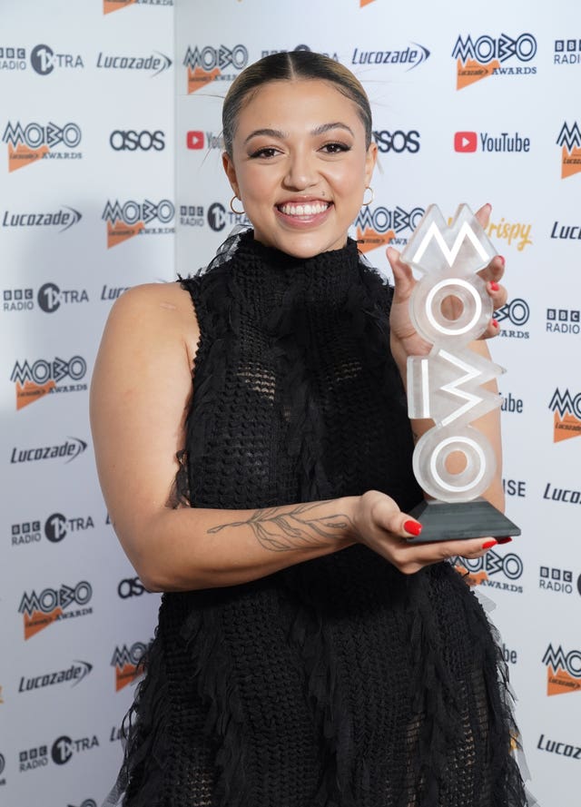 Mahalia in a black dress