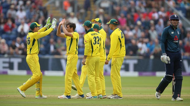 Alex Hales, right, leaves the field after being dismissed at Cardiff