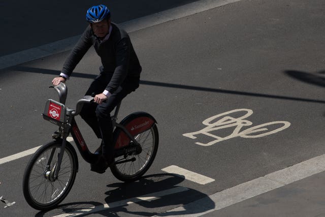 A cyclist uses a designated cycle lane
