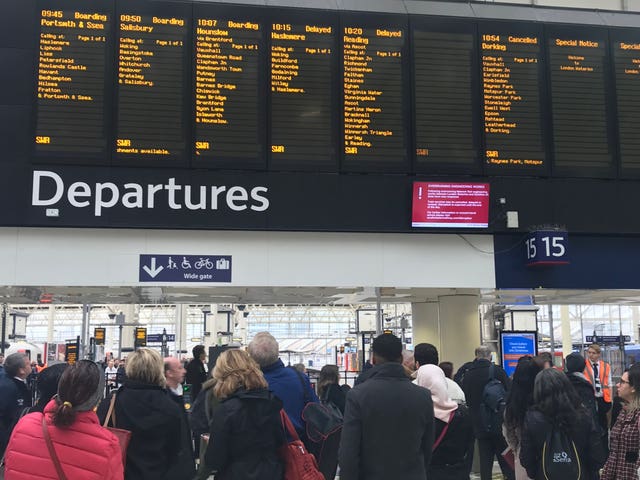 Passengers at London Waterloo station 