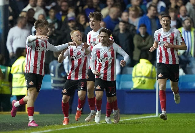 Patrick Roberts (second right) celebrates