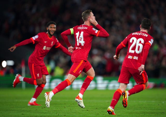 Jordan Henderson (centre) celebrates scoring Liverpool''s winner