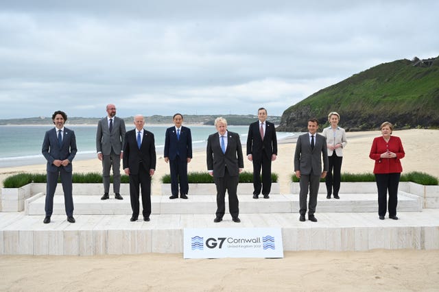 Social distancing was in evidence as the PM played host to the G7 gathering in Cornwall (Leon Neal/PA)