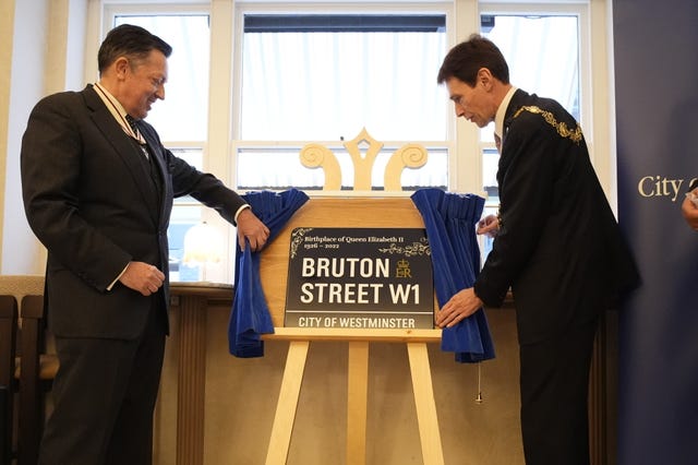 Deputy Lord-Lieutenant for the City of Westminster Stuart Shilson (left) and Lord Mayor of Westminster Robert Rigby during the unveiling of one the commemorative street signs