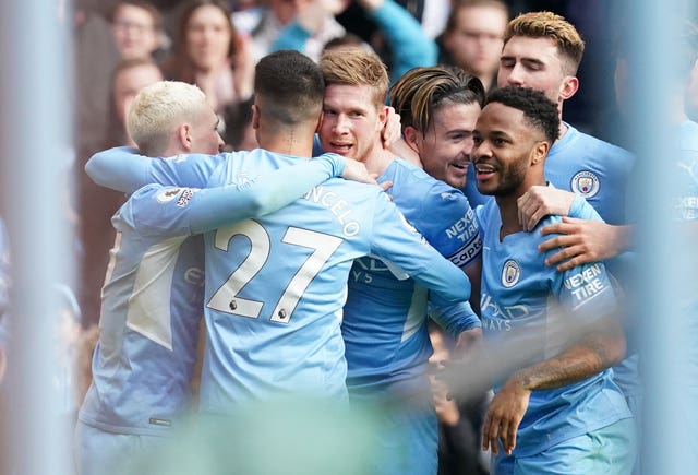 Kevin De Bruyne leads the celebrations as City took a big step towards another Premier League title