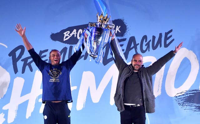 Vincent Kompany, left, and manager Pep Guardiola