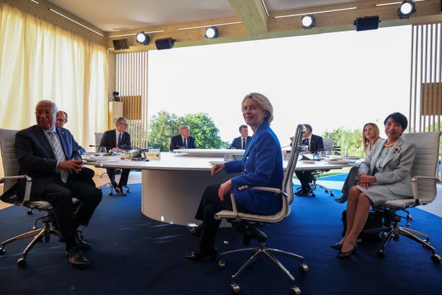 The attendees at a working leader’s dinner during the G7 summit in Evian, France