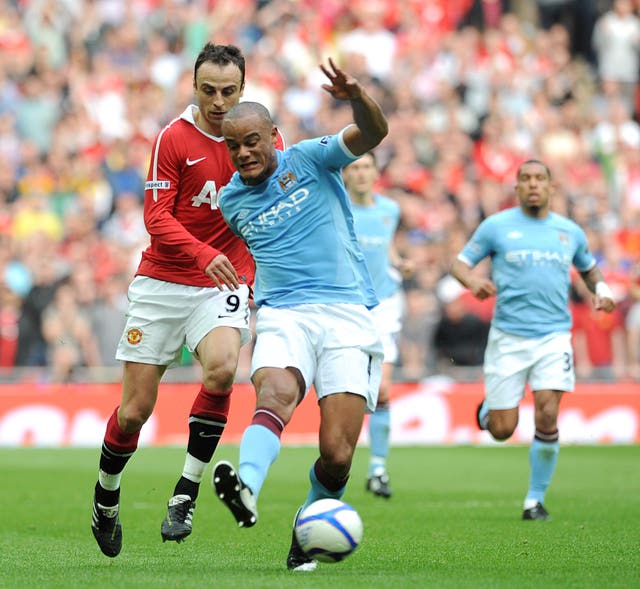 Manchester City's Vincent Kompany (right) in action at Wembley (PA)