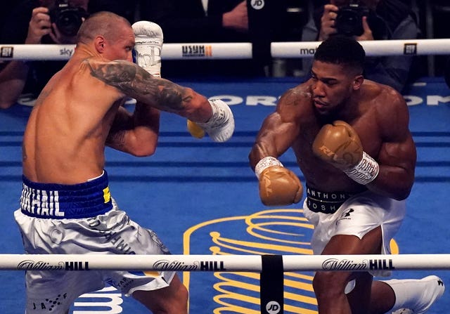 Oleksandr Usyk (left) claimed a dominant points victory over Anthony Joshua